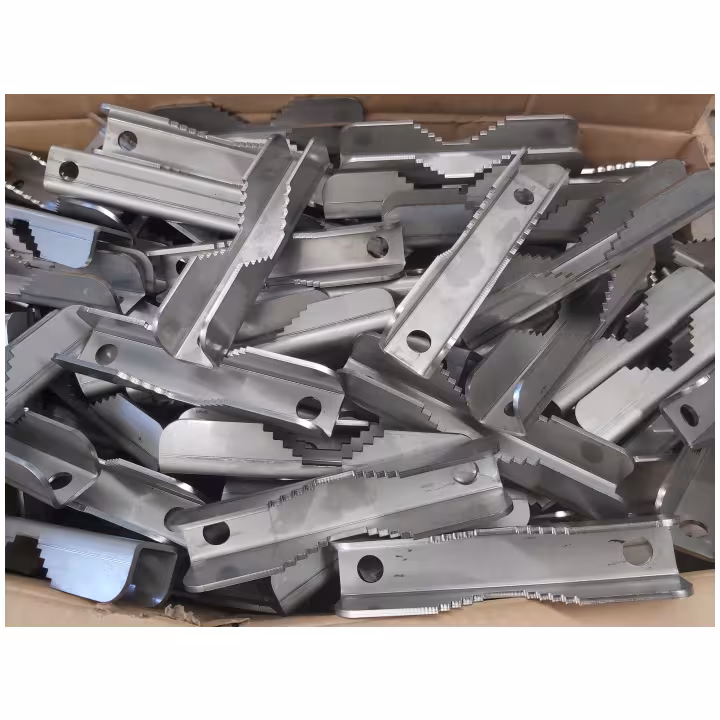 pile of stainless steel serrated pipe clamps