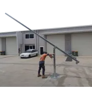 APAC GH100 Galvanised Steel Pole Hinging mast being winch raised