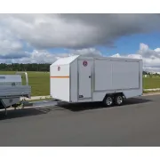 Dual Axle enclosed nippers trailer doors closed
